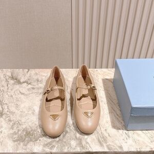Prada Nude Beige Mary Jane Flats with Gold Triangle Logo